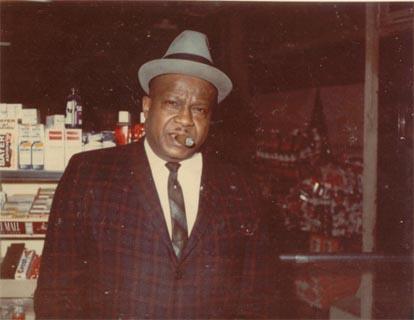 Oswald (Jack Oscar) Sewell standing inside of Gail's Certified Market. It was located on the west side of Chicago.