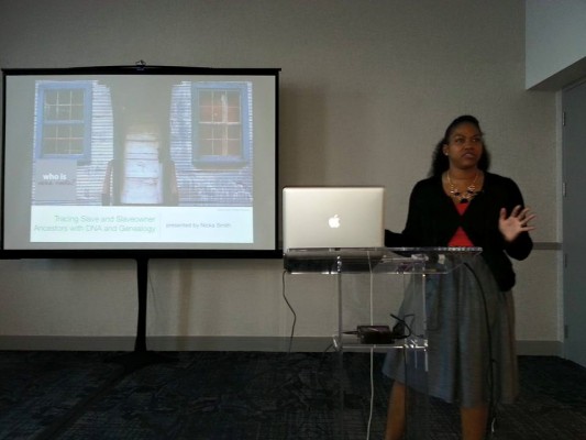 Me presenting on "Tracing Slaves and Slaveholders Using Genealogy and DNA." Image courtesy Anita Paul.