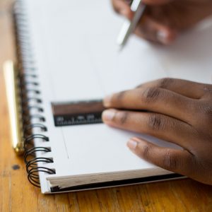 Notepad Photo by Tamarcus Brown on Unsplash